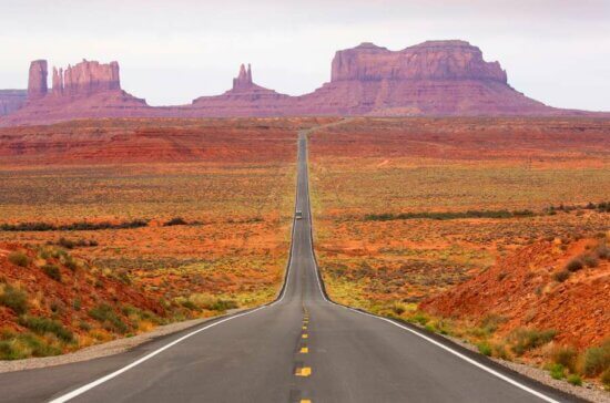 Highway in Monument Valley - Travel Deals from the USA - Wake Up Here