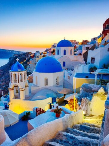 Clifftop Sunset in Santorini, Greece - Travel Deals from the USA - Wake Up Here