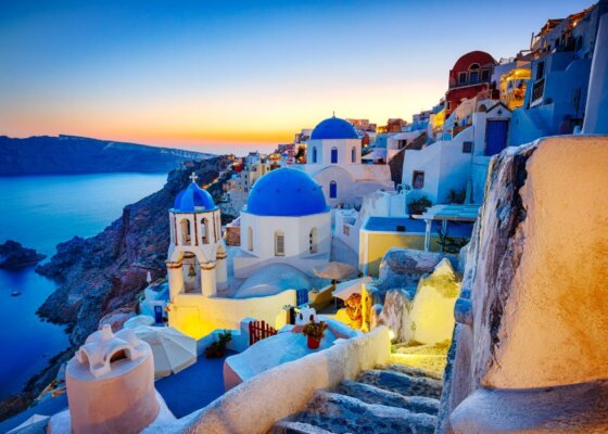 Clifftop Sunset in Santorini, Greece - Travel Deals from the USA - Wake Up Here