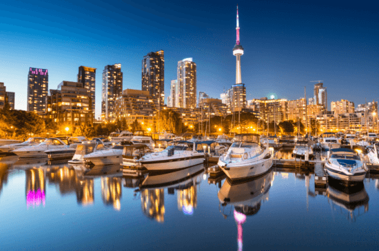 Toronto Skyline Harbor at Twilight - Canada - Travel Deals from the USA - Wake Up Here